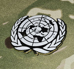 Insigne de casquette des Nations Unies
