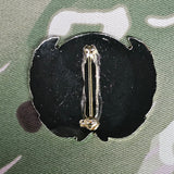 Insigne de casquette des Nations Unies